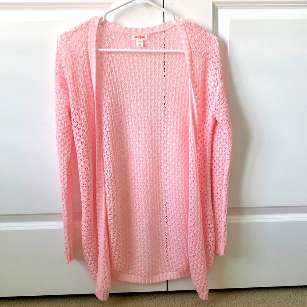 This is a pink Cat and Jack sweater from Target, it’s a size 10/12 in girls.